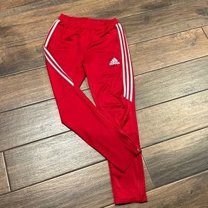 Adidas Boys L red athletic pants.